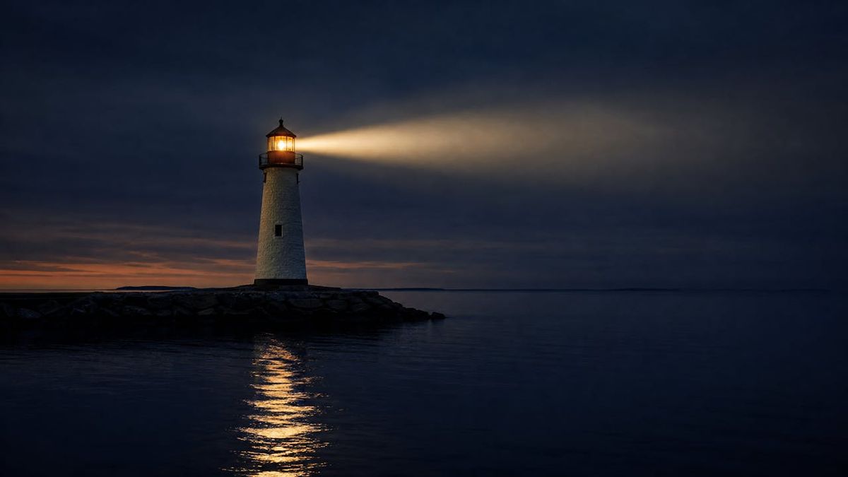 A lighthouse beam sweeping over calm dark water at dusk